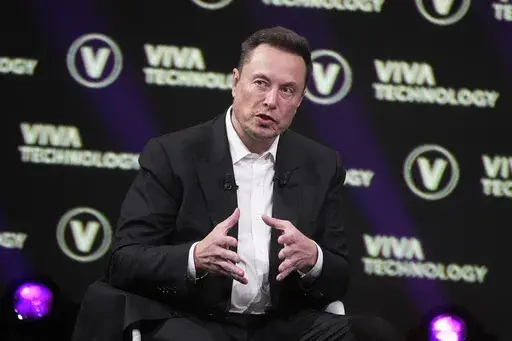 Elon Musk, who owns Twitter, Tesla and SpaceX, speaks at the Vivatech fair, in Paris, France, Friday, June 16, 2023. The head of Elon Musk’s social media platform X says the company formerly known has Twitter has removed hundreds of Hamas-linked accounts and taken down or labeled thousands of pieces of content since the militant group’s attack on Israel. (AP Photo/Michel Euler, File)