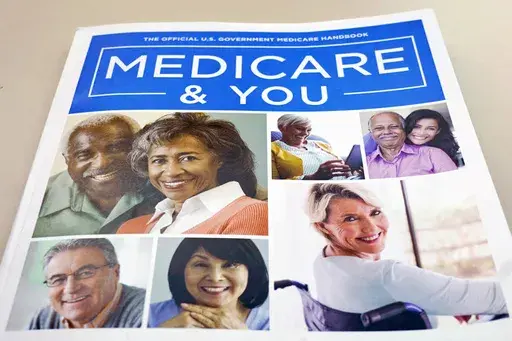 The U.S. Medicare Handbook is photographed in Washington, Nov. 8, 2018. Obesity drugs like Wegovy and Zepbound that are capturing the attention of celebrities and showing promising results in helping people shed pounds will stay out of reach for America's older adults. A decades-old law on the books bans Medicare from paying for weight loss drugs. (AP Photo/Pablo Martinez Monsivais, File)