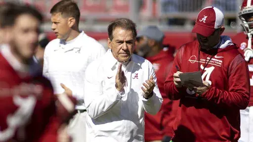 Alabama head coach Nick Saban cheers his team before an NCAA college football game against New Mexico State, Saturday, Nov. 13, 2021, in Tuscaloosa, Ala. (AP Photo/Vasha Hunt)