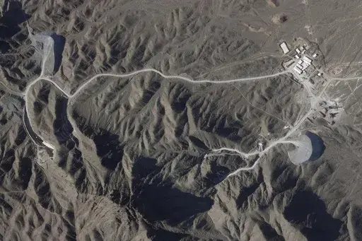 This satellite photo from Planet Labs PBC shows construction on a new underground facility at Iran's Natanz nuclear site near Natanz, Iran, on April 14, 2023. A new underground facility at the Natanz enrichment site may put centrifuges beyond the range of a massive so-called "bunker buster" bomb earlier developed by the U.S. military, according to experts and satellite photos analyzed by The Associated Press. (Planet Labs PBC via AP)