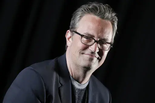 Matthew Perry poses for a portrait on Feb. 17, 2015, in New York. Perry, 54. The Emmy-nominated “Friends” actor whose sarcastic, but lovable Chandler Bing was among television’s most famous and quotable characters died Oct. 28, 2023. (Photo by Brian Ach/Invision/AP)