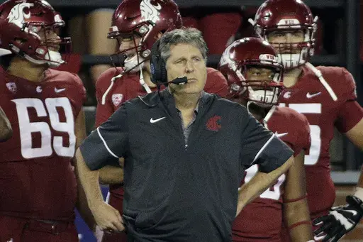 Washington State head coach Mike Leach stands on the sideline on during the first half of an NCAA college football game against Boise State in Pullman, Wash., Saturday, Sept. 9, 2017. (AP Photo/Young Kwak, File)