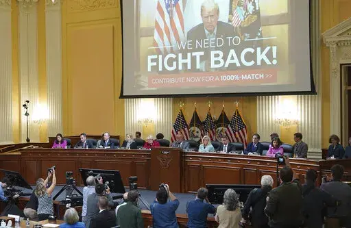 A video of former President Donald Trump speaking is displayed as the House select committee investigating the Jan. 6 attack on the U.S. Capitol continues to reveal its findings of a year-long investigation, at the Capitol in Washington, Monday, June 13, 2022.   (Mandel Ngan/Pool via AP)
