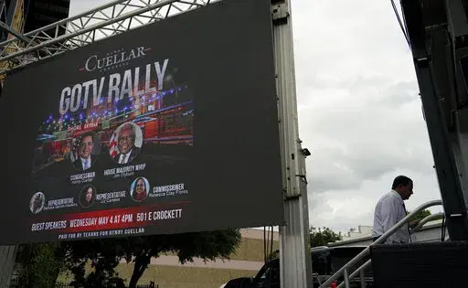 U.S. Rep. Henry Cuellar, D-Laredo, walks to the stage during a campaign event, Wednesday, May 4, 2022, in San Antonio. Cuellar, a 17-year incumbent and one of the last anti-abortion Democrats in Congress, is in his toughest reelection campaign, facing a May 24 primary runoff against progressive Jessica Cisneros. (AP Photo/Eric Gay)