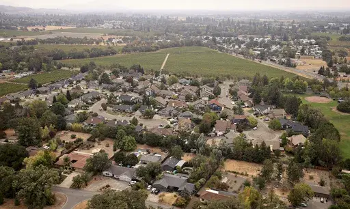 This aerial photo shows a subdivision at the site of a proposed resort and casino development, Sept. 17, 2021, near Windsor, Calif. (Kent Porter/The Press Democrat via AP)