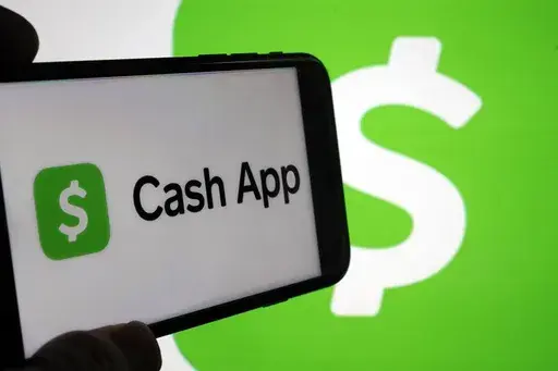 Cash App logos are seen on a phone screen, Sept. 8, 2023, in New York. (AP Photo/Richard Drew, File)