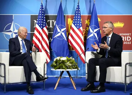President Joe Biden, left, speaks with NATO Secretary General Jens Stoltenberg during a meeting at the NATO summit in Madrid, Spain on June 29, 2022. Biden is welcoming outgoing NATO Secretary-General Jens Stoltenberg to the White House on Monday, June 12, 2023, as the competition to find his successor to lead the military alliance heats up. Stoltenberg, who has led NATO since 2014 indicated earlier this year he would move on when his term expires at the end of September. (AP Photo/Susan Walsh, 