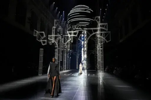 A model wears a creation for the Fendi Spring-Summer 2022 Haute Couture fashion collection, in Paris, Thursday, Jan. 27, 2022. (AP Photo/Thibault Camus)