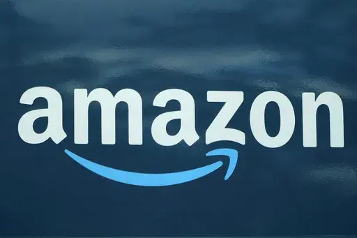 An Amazon logo appears on a delivery van, Oct. 1, 2020, in Boston. Amazon plans to eliminate 9,000 more jobs in the next few weeks, the company's CEO Andy Jassy said in a memo to staff on Monday, March 20, 2023. The job cuts would mark the second largest round of layoffs in the company's history, adding to the 18,000 employees the company said it would lay off in January. (AP Photo/Steven Senne, File)