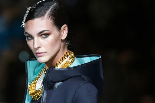 A model walks the runway at the Tom Ford spring/summer 2022 fashion show at Lincoln Center during New York Fashion Week on Sunday, Sept. 12, 2021. (AP Photo/Eduardo Munoz Alvarez)
