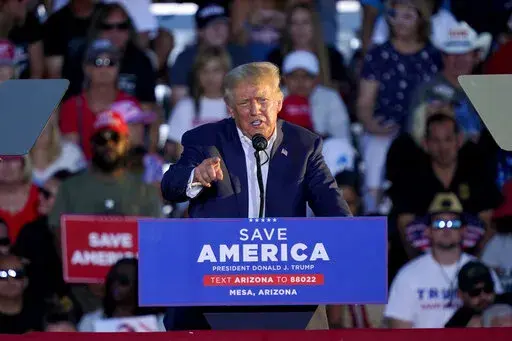 Former President Donald Trump speaks at a rally, Sunday, Oct. 9, 2022, in Mesa, Ariz. (AP Photo/Matt York)