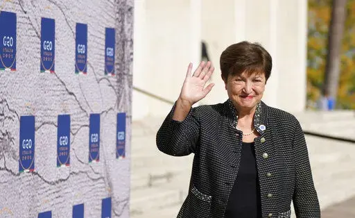 International Monetary Fund President Kristalina Georgieva waves as she arrives for a meeting of G20 finance and health ministers at the Salone delle Fontane (Hall of Fountains) in Rome, Oct. 29, 2021. (AP Photo/Alessandra Tarantino, File)
