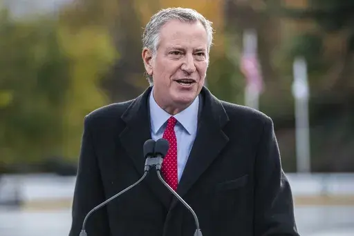 New York City Mayor Bill de Blasio speaks at the opening of New York's Wollman Rink in Central Park, Nov. 14, 2021. The former New York City mayor was ordered Thursday, June 15, 2023, to pay $475,000 by a city ethics board that found he misused public funds on a police security detail during his failed presidential bid. (AP Photo/Brittainy Newman, File)