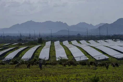 A solar power plant sits in Pavagada Tumkur district, in the southern Indian state of Karnataka, India, Thursday, Sept. 15, 2022. For countries to transition away from fossil fuels and toward cleaner energies like solar power, supply chains for components need to be more geographically diverse, officials said during a conference on solar energy in New Delhi said on Tuesday, Oct. 18. (AP Photo/Rafiq Maqbool)