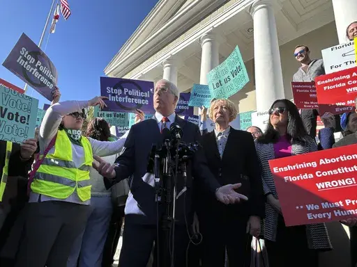 Liberty Counsel founder and Chairman Mathew Staver speaks to reporters in front of the Florida Supreme Court after telling justices a proposed amendment to protect abortion rights should be kept off the ballot on Wednesday, Feb. 7, 2024, in Tallahassee, Fla. (AP Photo/Brendan Farrington)
