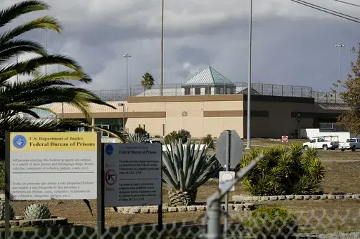 The Federal Correctional Institution stands in Dublin, Calif., Dec. 5, 2022. The federal Bureau of Prisons says it is planning to close a women’s prison in California known as the “rape club” despite attempts to reform the troubled facility after an Associated Press investigation exposed rampant staff-on-inmate sexual abuse. (AP Photo/Jeff Chiu, File)