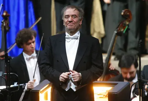 In this Wednesday, May 1, 2013 photo, Valery Gergiev, looks on after a "pre-premiere" performance, put on for veterans and senior employees of the theatre in the new Mariinsky Theatre on the eve of the it's official opening in St.Petersburg, Russia.  Gergiev, a conductor who is close to Russia President Vladimir Putin, will not lead the Vienna Philharmonic in a five-concert U.S. tour that starts at Carnegie Hall on Friday night. The 68-year-old Russian conductor is music director of the Mariinsk