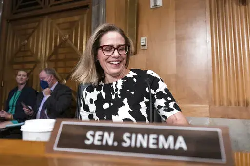 Sen. Kyrsten Sinema, D-Ariz., arrives for a meeting of the Senate Homeland Security Committee at the Capitol in Washington, Aug. 3, 2022. Sinema won Democrats a Senate seat from Arizona for the first time in a generation thanks in no small part to unity in her party and division among Republicans. Since then, Democrats have picked up the other Senate seat and won the top three state offices. But that winning formula is in jeopardy because of Sinema's estrangement and divorce from the Democratic 