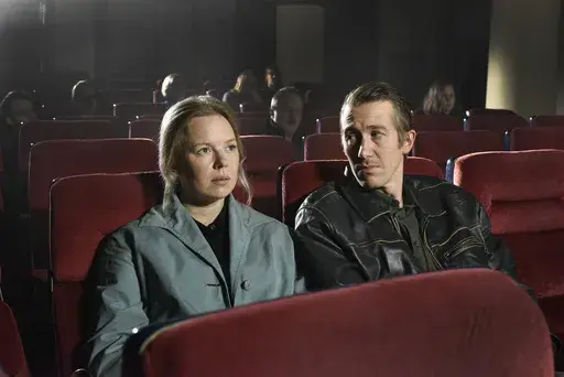This image released by MUBI shows Alma Pöysti, left, and Jussi Vatanen in a scene from "Fallen Leaves." (MUBI via AP)