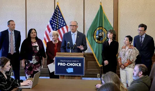 Washington Gov. Jay Inslee speaks during a press conference, Tuesday, April 4, 2023, at the state Capitol in Olympia, Wash. The state of Washington has stockpiled a three-year supply of an abortion pill in anticipation of a court ruling that could limit its availability, Inslee announced Tuesday. (Steve Bloom/The Olympian via AP)