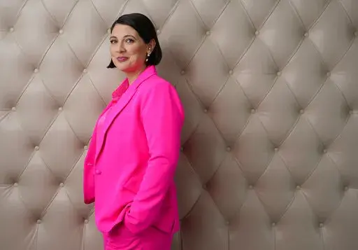 Taylor Jenkins Reid, author of the novel "Daisy Jones and the Six," poses for a portrait at the Four Seasons Hotel, Wednesday, Feb. 22, 2023, in Los Angeles. (AP Photo/Chris Pizzello)
