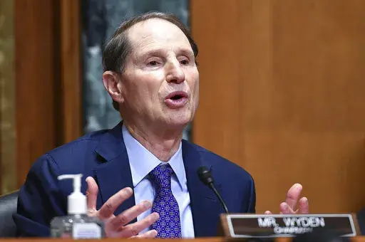 Sen. Ron Wyden, D-Ore., speaks during a Senate Finance Committee hearing on Oct. 19, 2021, on Capitol Hill in Washington. Child welfare officials in Oregon will stop using an algorithm to help decide which families are investigated by social workers, opting instead for an entirely new process that officials said will make more racially equitable decisions. Wyden said he had long been concerned about the algorithms used by his state’s child welfare system and reached out to the department again