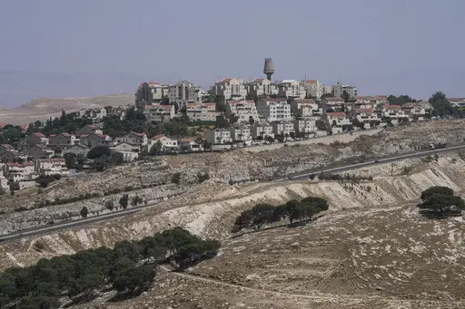 A view of Israeli settlement of Maale Adumim, in the West Bank, Sunday, June 18, 2023. Israel's government on Sunday granted Finance Minister Bezalel Smotrich, a pro-settlement firebrand, authority over planning in the occupied West Bank and lifted red tape on the settlement housing approval process, Israeli media reported. (AP Photo/Mahmoud Illean)