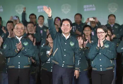 Taiwanese Vice President Lai Ching-te, also known as William Lai, center, celebrates his victory with running mate Bi-khim Hsiao, right, and supporters in Taipei, Taiwan on Jan. 13, 2024. Taiwan's incoming president is promising more of the same. The question is what that will bring, not only for Taiwan but also for its relations with China, the United States and others with an interest in the island of 23 million people that supplies many of the advanced semiconductors that keep the world runni