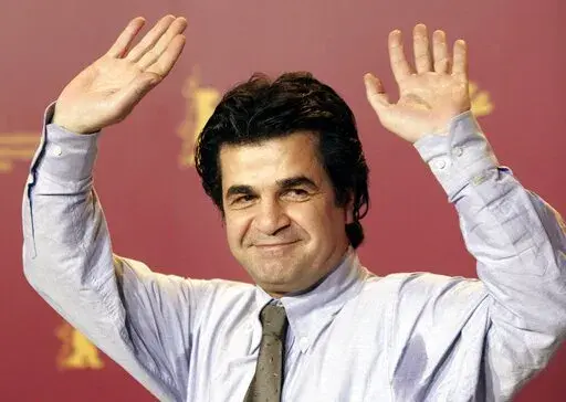 Iranian film director Jafar Panahi reacts as he attends the 56th Berlin Film Festival 'Berlinale' in Berlin, Feb. 17, 2006. Iranian authorities have arrested an internationally renowned filmmaker, media reported on Tuesday, July 12, 2022, the third Iranian director to be locked up in less than a week as the government escalates a crackdown on the country's celebrated cinema industry. (AP Photo/Jan Bauer, File)