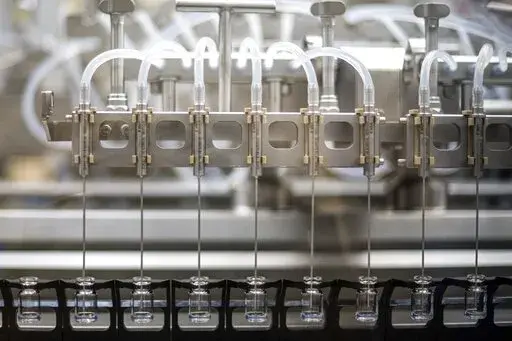 This May 2022 photo provided by Pfizer shows production of the Pfizer's COVID-19 vaccine for children under 5 in Puurs, Belgium.   U.S. health advisers on Saturday, June 18,  recommended COVID-19 vaccines for infants, toddlers and preschoolers — the last group without the shots. (Pfizer via AP)