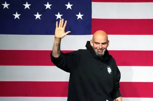 Pennsylvania Lt. Gov. John Fetterman takes the stage at an election night party in Pittsburgh on Nov. 9, 2022. Fetterman, the Pennsylvania Democrat who suffered a stroke during his campaign last year, was hospitalized Wednesday night, Feb. 8, 2023, after feeling lightheaded while attending a Senate Democratic retreat, his office said. (AP Photo/Gene J. Puskar, File)