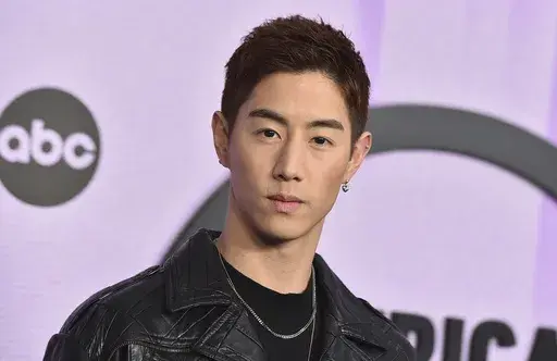 K-pop musician Mark Tuan arrives at the American Music Awards in Los Angeles on Nov. 20, 2022. On Friday, he released “Fallin,” following his 2022 debut solo album, “The Other Side.” (Photo by Jordan Strauss/Invision/AP, File)