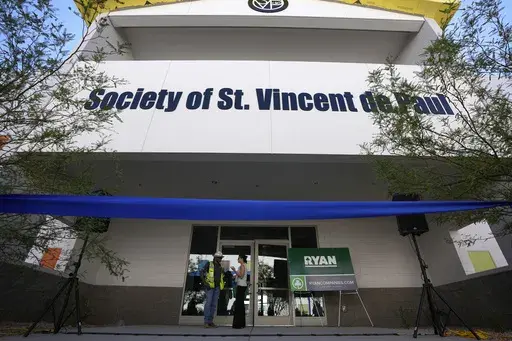 St. Vincent de Paul allows a first look at the nearly-completed, longer-term, 100-bed shelter for older adults, military veterans and people with disabilities who will be able to keep their companion animals at a nearby center designed for them, Thursday, May 9, 2024, in Phoenix. (AP Photo/Ross D. Franklin)