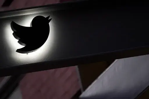 The Twitter logo is seen on the awning of the building that houses the Twitter office in New York, Wednesday, Oct. 26, 2022. Twitter has dropped out of a voluntary European Union agreement to combat online disinformation, a top EU official said Friday, May 26, 2023. (AP Photo/Mary Altaffer, File)