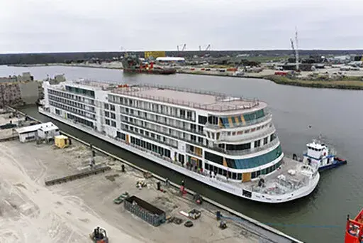 This photo provided by Viking shows the Viking Mississippi at Edison Chouest Offshore's LaShip shipyard in Houma, La., on March 7, 2022.  The Swiss company’s cruises along the length of the Mississippi River are a step closer to reality — its new 386-passenger ship has touched water for the first time. Viking River Cruises of Basel, which announced plans for Mississippi River cruises in 2015, celebrated the “float out” of the Viking Mississippi on Monday, March 7, at Edison Chouest Off