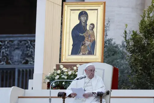 Pope Francis, sitting in front of a replica of the icon 'Maria Salus populi romani'', addresses the participants into "Together", a vigil prayer for the Synod of Bishops with church leaders in St. Peter's Square at The Vatican, Saturday, Sept. 30, 2023, three days ahead of the official opening of the XVI Assembly of the Synod of Bishops on 4 October. Pope Francis is convening a global gathering of bishops and laypeople to discuss the future of the Catholic Church, including some hot-button issue