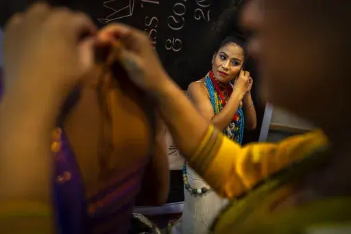 Participants get ready for the Miss Trans Northeast 22, beauty pageant in Guwahati, India, Wednesday, Nov. 30, 2022. In a celebration of gender diversity and creative expression, a beauty pageant in eastern Indian state of Assam brought dozens of transgender models on stage in Guwahati. Sexual minorities across India have gained a degree of acceptance especially in big cities and transgender people were given equal rights as a third gender in 2014. But prejudice against them persists and the com