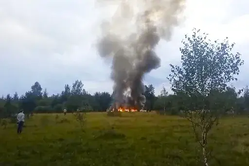 In this image taken from video, smoke rises from the crash of a private jet near the village of Kuzhenkino in the Tver region of Russia, on Wednesday, Aug. 23, 2023. Mercenary leader Yevgeny Prigozhin, head of the Wagner Group, and his top lieutenants were among the 10 people killed in the crash northwest of the Russian capital. (AP Photo, File)