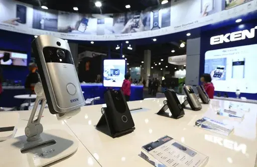 An EKEN doorbell camera, along with other models, are shown on display at CES International, Jan. 10, 2019, in Las Vegas. Some doorbell cameras sold by Amazon and other online retailers have security flaws that could allow bad actors to view footage from the devices or control them completely, according to an investigation published Thursday, Feb. 29, 2024, by Consumer Reports. (AP Photo/Ross D. Franklin, File)