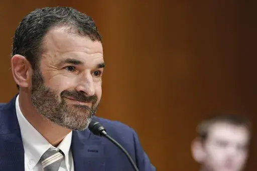 Daniel Werfel testifies before the Senate Finance Committee during his confirmation hearing to be the Internal Revenue Service Commissioner, Wednesday, Feb. 15, 2023, on Capitol Hill in Washington. Werfel, President Joe Biden's nominee to lead the Internal Revenue Service says he will commit to not increasing tax audits on businesses and households making less than $400,000 per year. (AP Photo/Mariam Zuhaib)