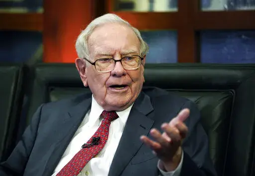 In this May 7, 2018 file photo, Berkshire Hathaway Chairman and CEO Warren Buffett speaks during an interview in Omaha, Neb. The world's most expensive lunch will go on sale again this spring when Buffett auctions off a private meal to raise money for a California homeless charity one last time. Buffett held the online lunch auction once a year for 20 years before the pandemic began to raise money for the Glide Foundation, which helps the homeless in San Francisco. (AP Photo/Nati Harnik, file)