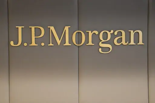 The logo of JPMorgan bank is pictured at the new French headquarters of JP Morgan bank, Tuesday, June 29, 2021, in Paris. JPMorgan Chase is defending itself against a lawsuit by the U.S. Virgin Islands accusing it of empowering Jeffrey Epstein to abuse teenage girls. Lawyers for the giant bank said in court papers Tuesday, May 23, 2023, that it was the islands that enabled the financier to commit his crimes. (AP Photo/Michel Euler, Pool, File)