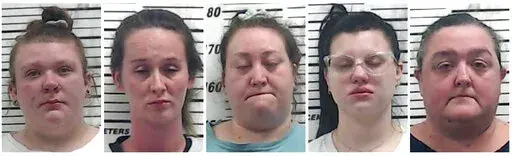 This combo of booking images provided by the Monroe County, Miss., Sheriff’s Office shows from left, Jennifer Newman, Misty Shyenne Mills, Oci-Anna Kilburn, Sierra McCandless and Traci Diane Hutson. Authorities said Friday, Oct. 21, 2022, that the five people linked to viral video footage of workers using a scary mask to frighten children at a Mississippi daycare are now facing charges. Monroe County Sheriff Kevin Crook said four of the women, Newman, Mills, Kilburn, and McCandless each face t