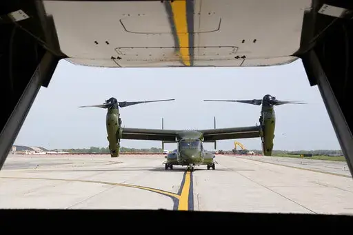 A U.S. Marine Corps Osprey aircraft taxies behind an Osprey carrying members of the White House press corps at Andrews Air Force Base, Md., on April 24, 2021. Norwegian authorities are searching for a U.S. Marine Corps aircraft that went missing during a training exercise. Norway's military says the Marine Osprey was reported missing Friday night. March 18, 2022, when it did not make a scheduled arrival at the Arctic Circle municipality Bodø. (AP Photo/Patrick Semansky)