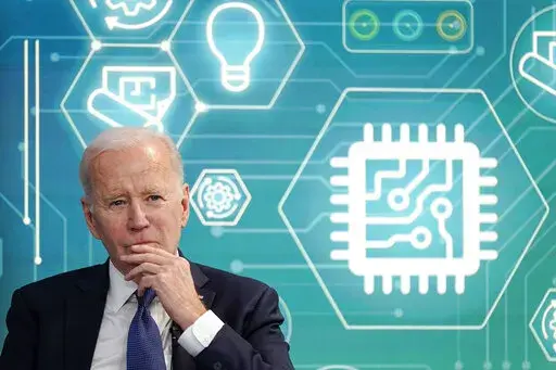 President Joe Biden attends an event to support legislation that would encourage domestic manufacturing and strengthen supply chains for computer chips in the South Court Auditorium on the White House campus, March 9, 2022, in Washington. Biden is working to create a manufacturing revival, even helping to put factory jobs in Republican territory under the belief it can restore faith in U.S. democracy. (AP Photo/Patrick Semansky, File)