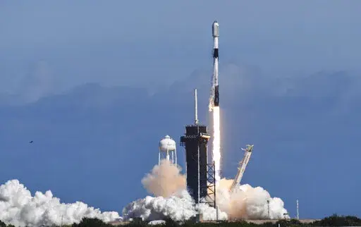 A SpaceX Falcon 9 rocket lifts off from Pad 39A at Kennedy Space Center, Fla.,Thursday, Feb. 3, 2022. The rocket is carrying a batch of Starlink satellites. Spacex's newest fleet of Starlink satellites are tumbling out of orbit because of a geomagnetic storm. In an online update Tuesday, Feb. 8, Elon Musk's company reported that up to 40 of the 49 small Internet-service satellites launched last Thursday have either re-entered the atmosphere and burned up, or are on the verge of doing so. (Craig 