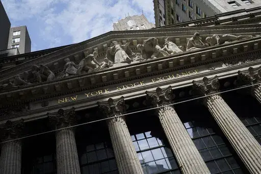 Sunlight shines on the facade of the New York Stock Exchange, Friday, July 8, 2022, in New York. U.S Stocks are edging higher in early trading on Wall Street Tuesday, July 12, 2022, as traders brace for a big week of news on inflation and company earnings reports. (AP Photo/John Minchillo, File)