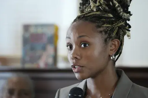 Jamese Wiley, a 28-year-old single mother of six, speaks about the positive impact the removal of a child support requirement by the Mississippi Department of Human Services, has on the Child Care Payment Program, at a news conference Monday, May 15, 2023, in Jackson, Miss. (AP Photo/Rogelio V. Solis)