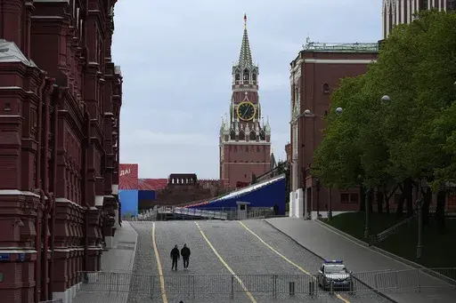 A view of the Red Square closed for Victory Parade preparation, with the Spasskaya Tower in the center, in Moscow, Russia, Wednesday, May 3, 2023. Russian authorities have accused Ukraine of attempting to attack the Kremlin with two drones overnight. The Kremlin on Wednesday decried the alleged attack attempt as a "terrorist act" and said Russian military and security forces disabled the drones before they could strike. (AP Photo/Alexander Zemlianichenko)
