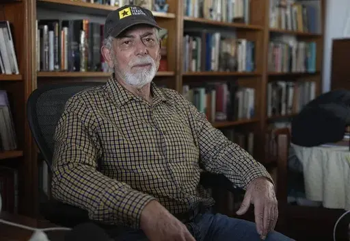 Journalist Gustavo Gorriti poses for a portrait at his home in Lima, Peru, Friday, April 26, 2024. Gorriti, 75, is one of Latin America’s most storied journalists with more than four decades of investigative reporting that exposed high-level abuse of power in Peru and abroad. (AP Photo/Martin Mejia)